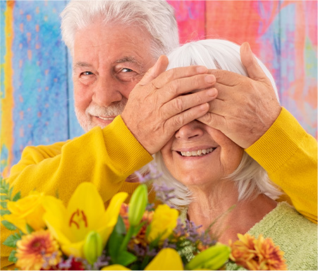 old couple still feeling young and energetic with colorful environment