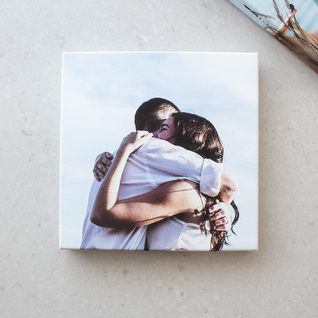 canvas couple hugging