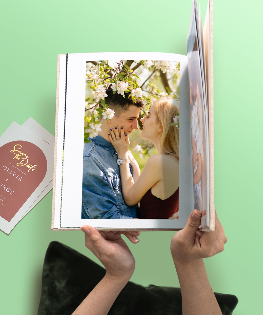 engagement wedding photo book with romantic couple under spring blossoms